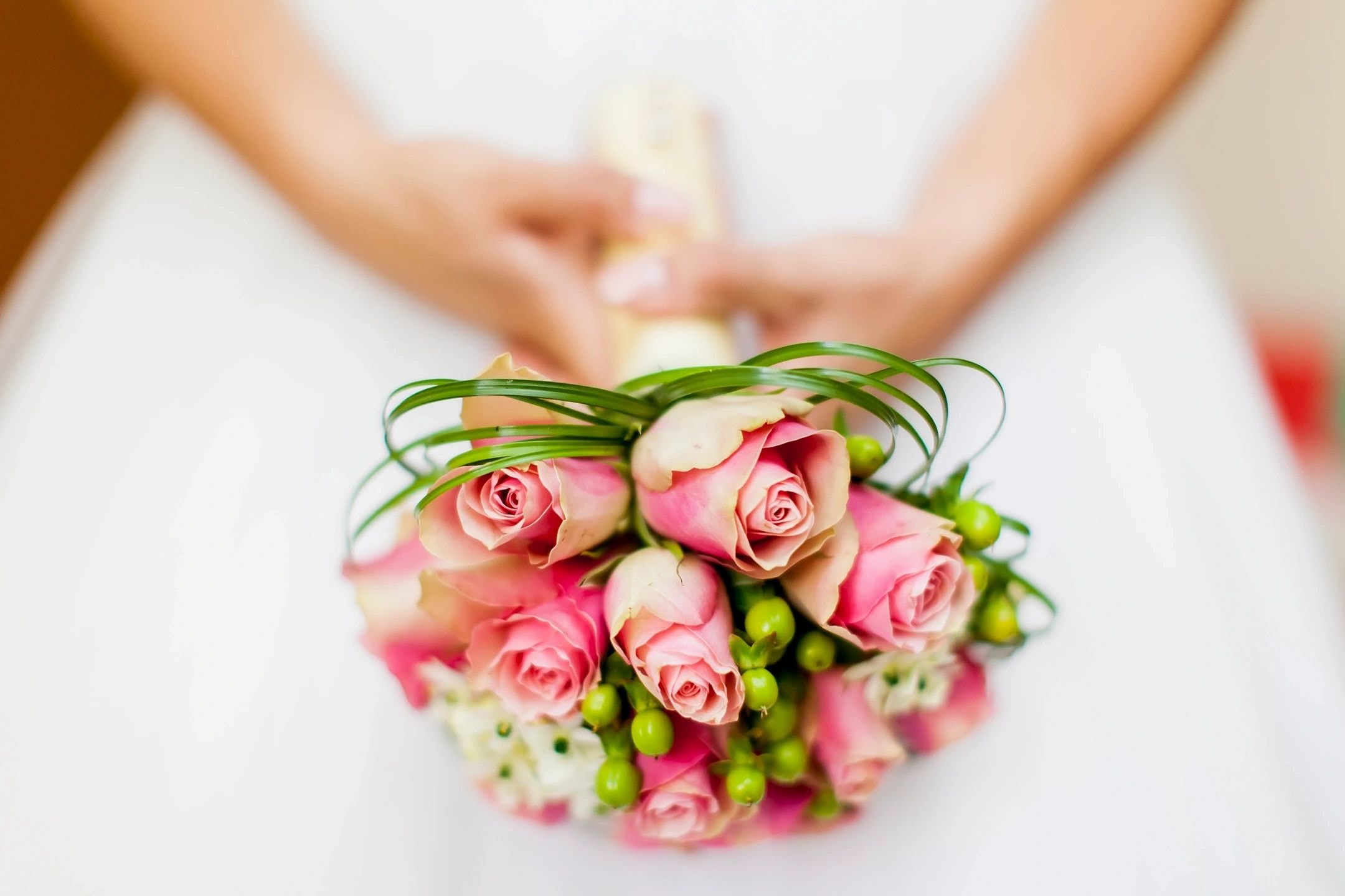 Bridal bouquet with pink and cream roses